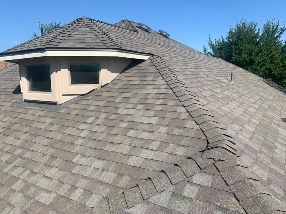 Completed gray shingle roof replacement by FRS in the Central Texas service area